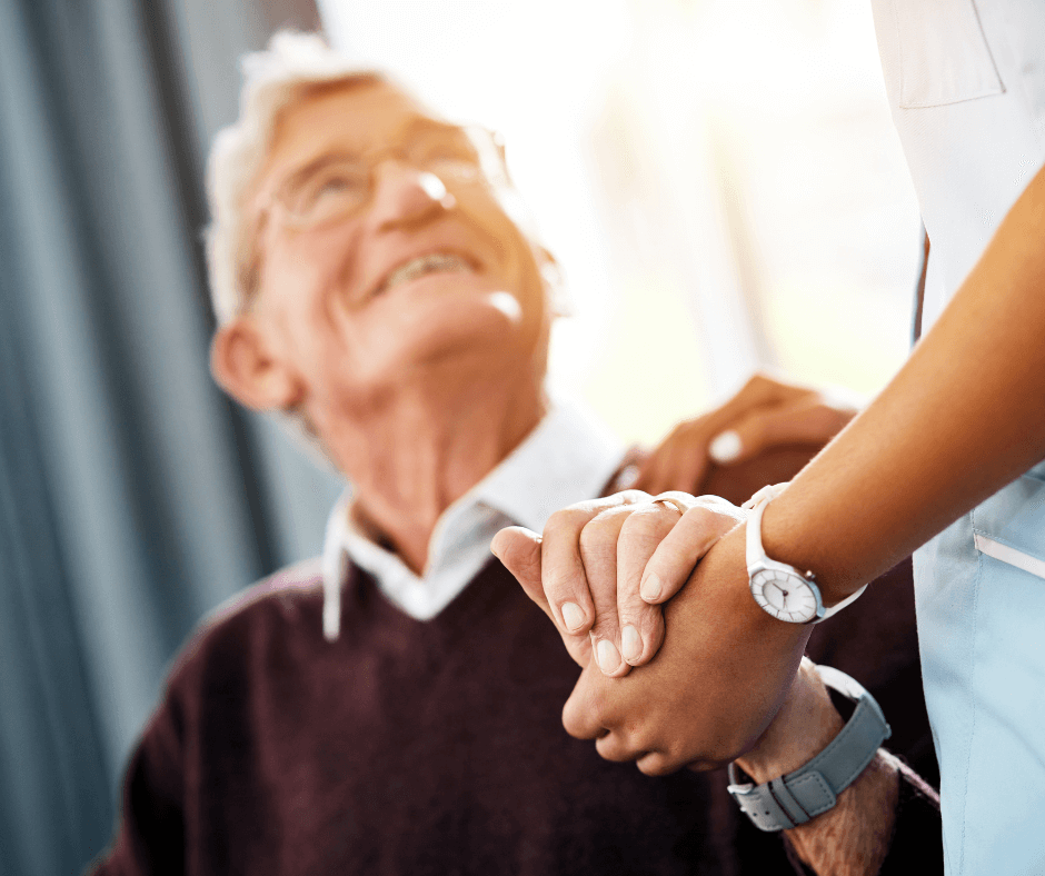 woman shows kindness to elderly man