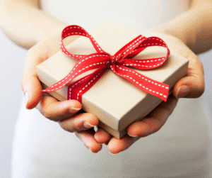 woman presenting wrapped gift