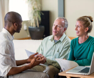 professional advisor speaks with clients