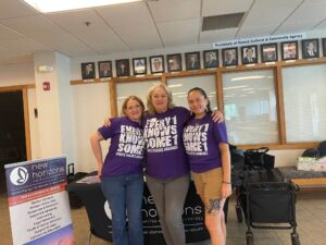 New-Horizons-Director-of-Programming-and-Personnel-Heidi-Svee-right-and-her-colleagues-kick-off-Domestic-Violence-Awareness-Month-with-the-agencys-annual-Dare-to-Self-Care-event