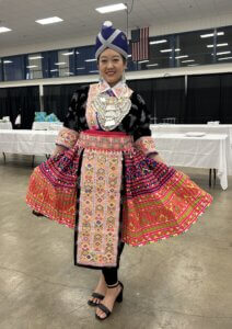 Valerie Hang wearing traditional Hmong attire.