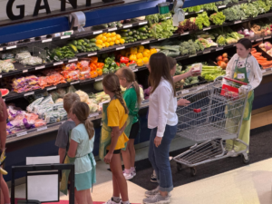 youth shopping at People's Food Coop